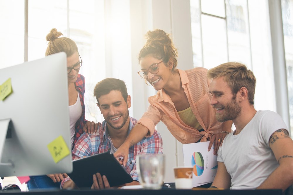 Young business people working at office on new project